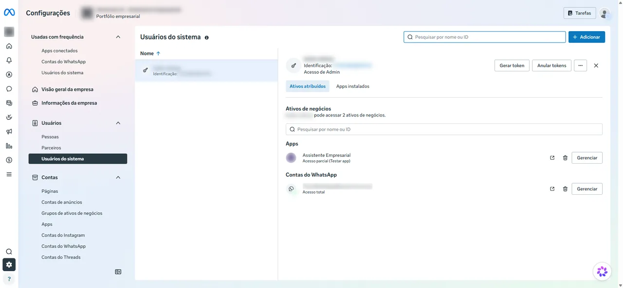 Tela Usuários do sistema do Gerenciador de Negócios com Ativos atribuídos e os botões Gerar token e Anular tokens.